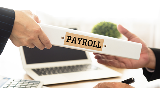 Payroll-binder-being-passed-off